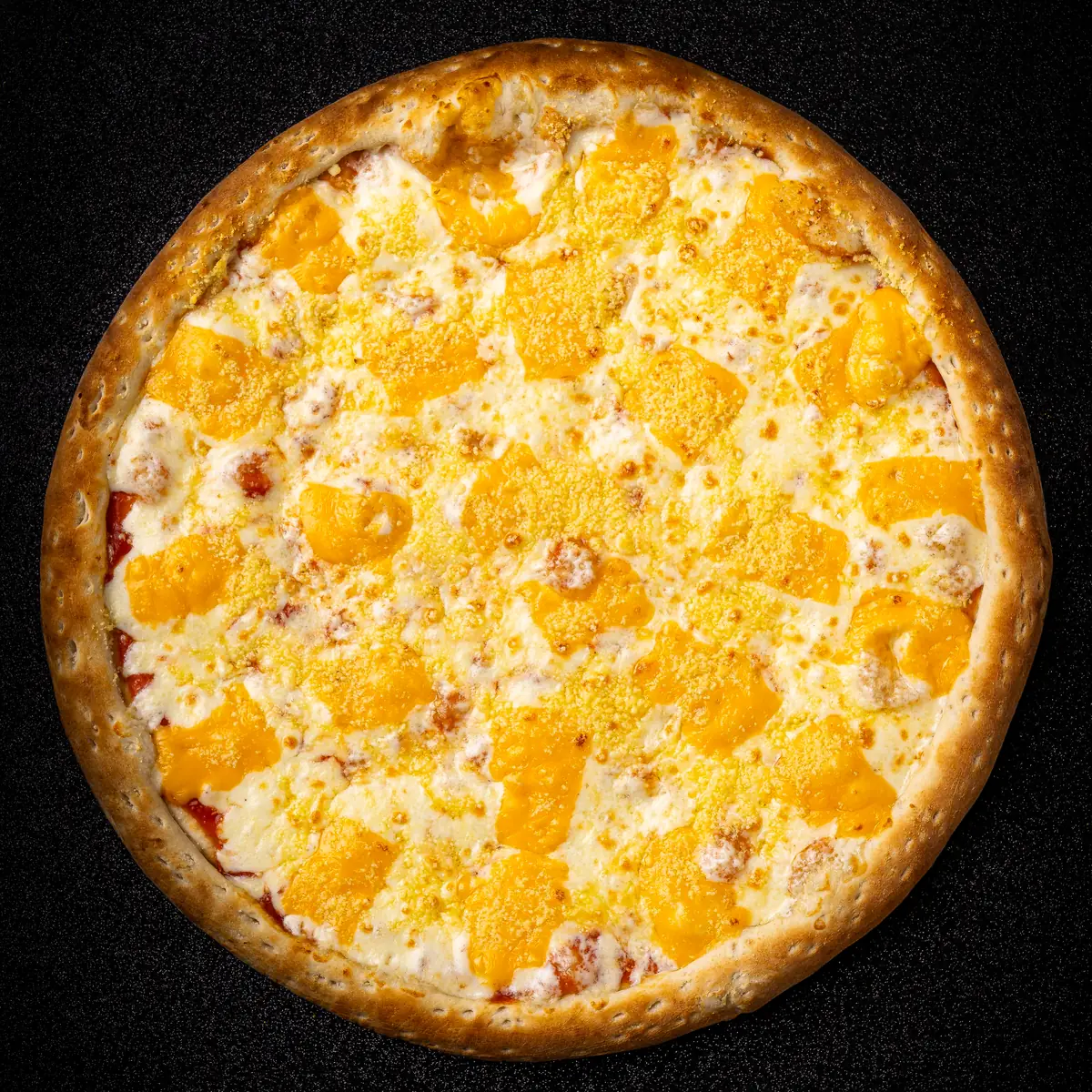 Foto real de la Pizza 4 Quesos de Yalus Pizza, vista desde arriba