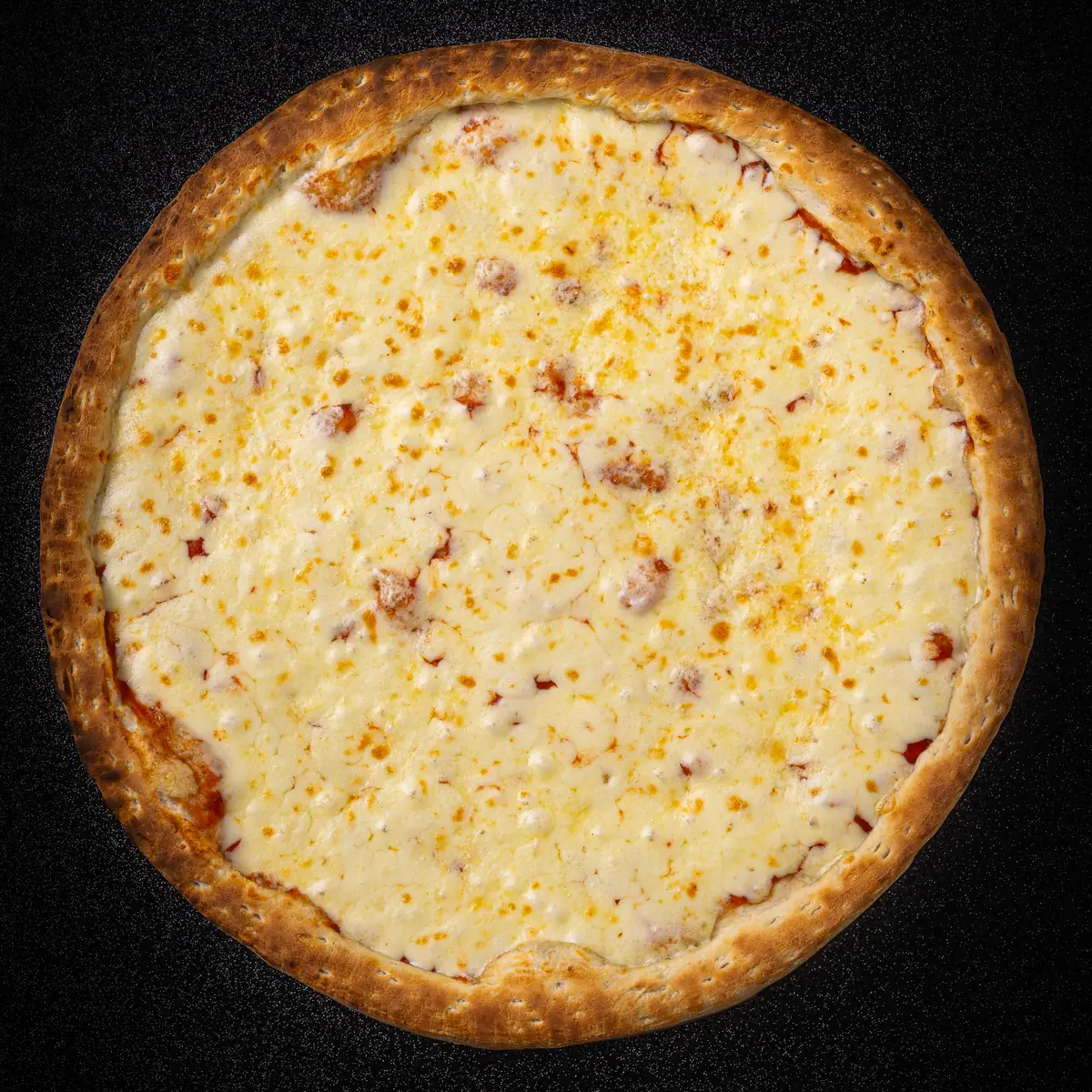 Foto real de la Pizza Doble Queso de Yalus Pizza, vista desde arriba
