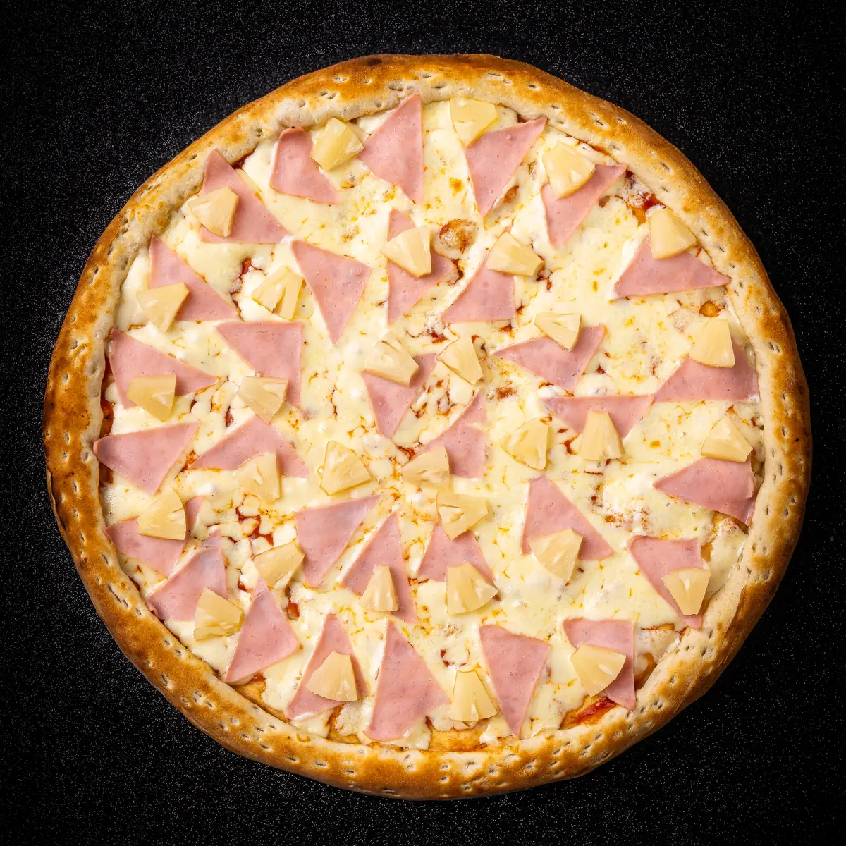 Foto real de la Pizza Hawaiana de Yalus Pizza, vista desde arriba