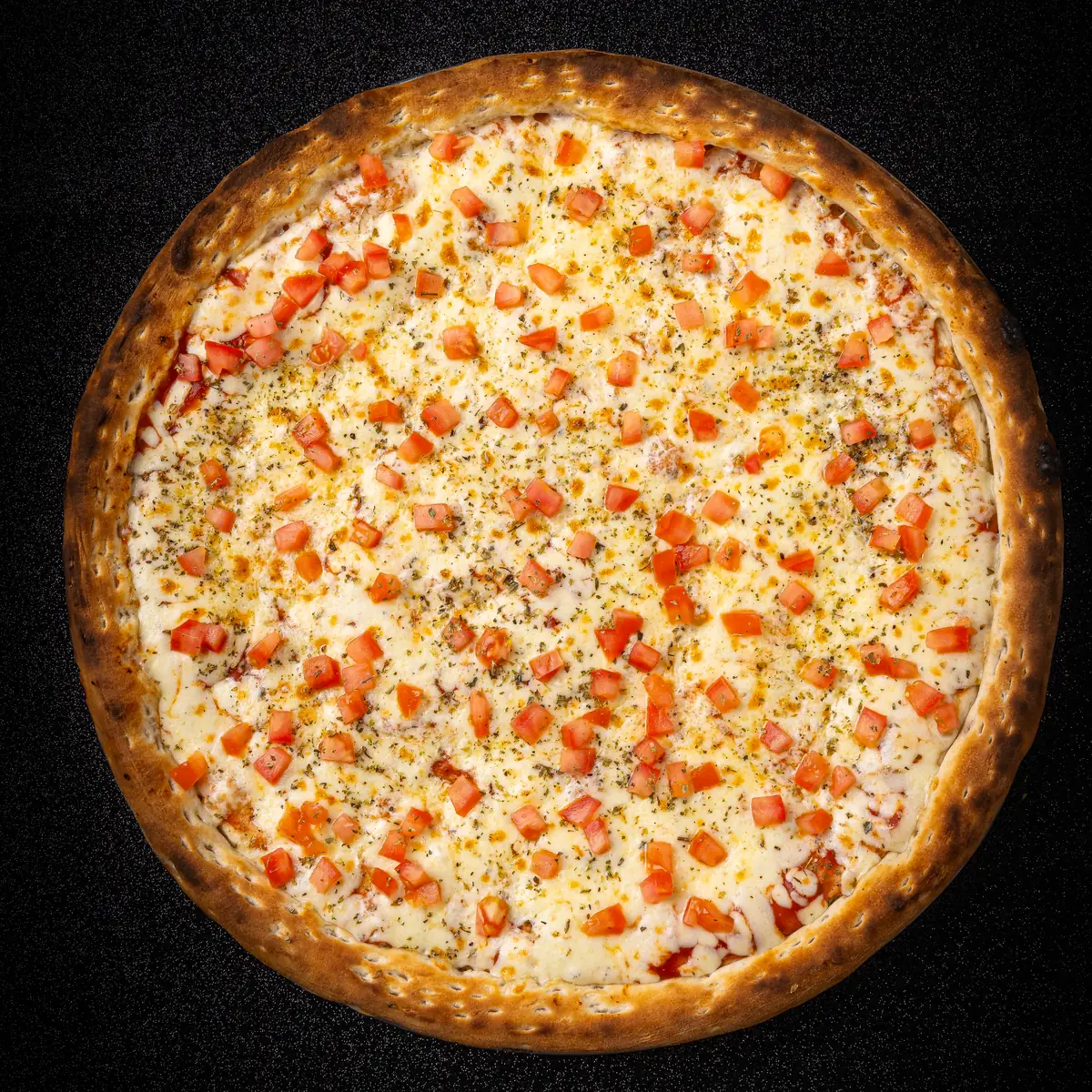 Foto real de la Pizza Napolitana de Yalus Pizza, vista desde arriba