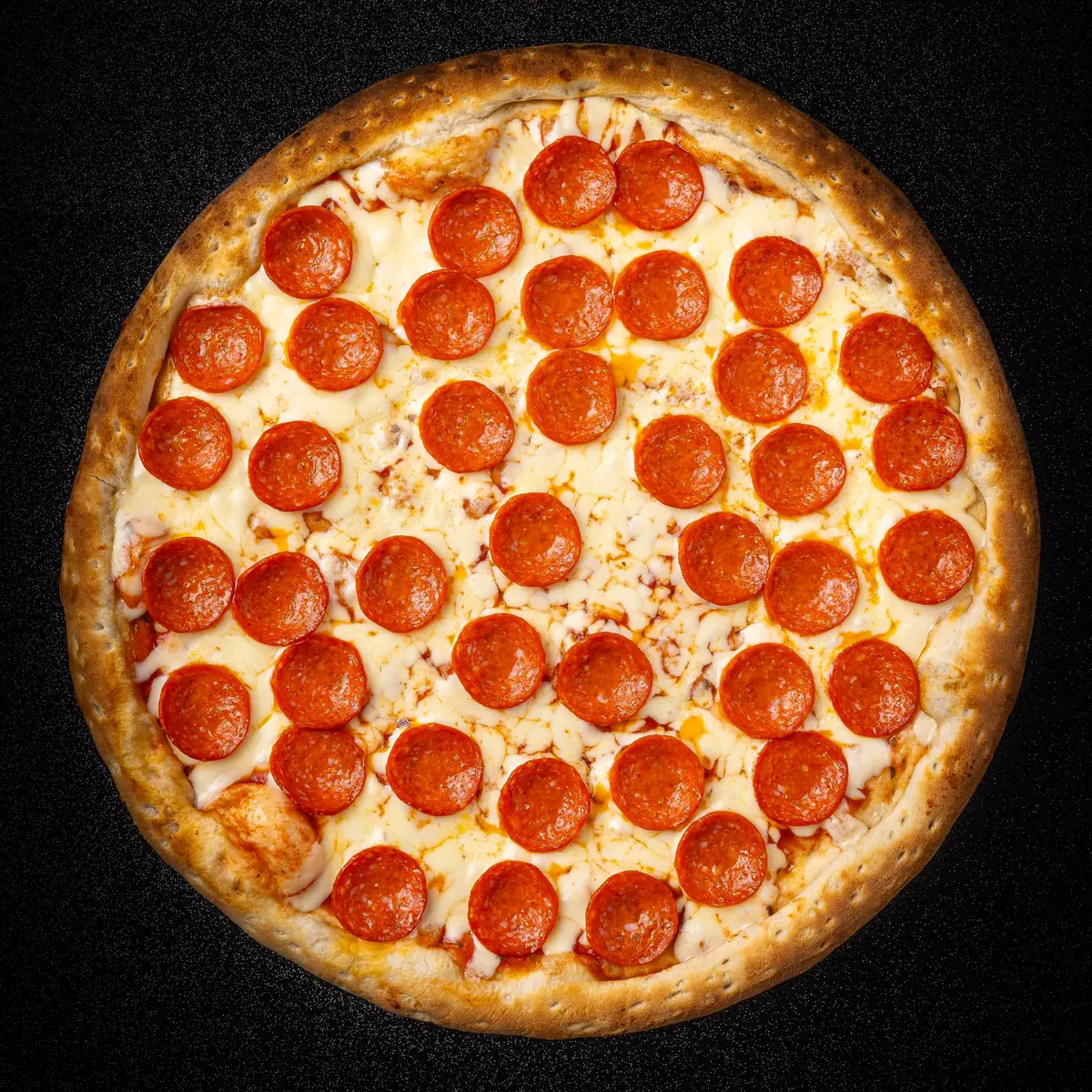 Foto real de la Pizza Pepperoni de Yalus Pizza, vista desde arriba