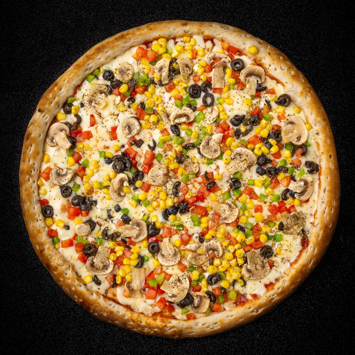 Foto real de la Pizza Vegetariana de Yalus Pizza, vista desde arriba